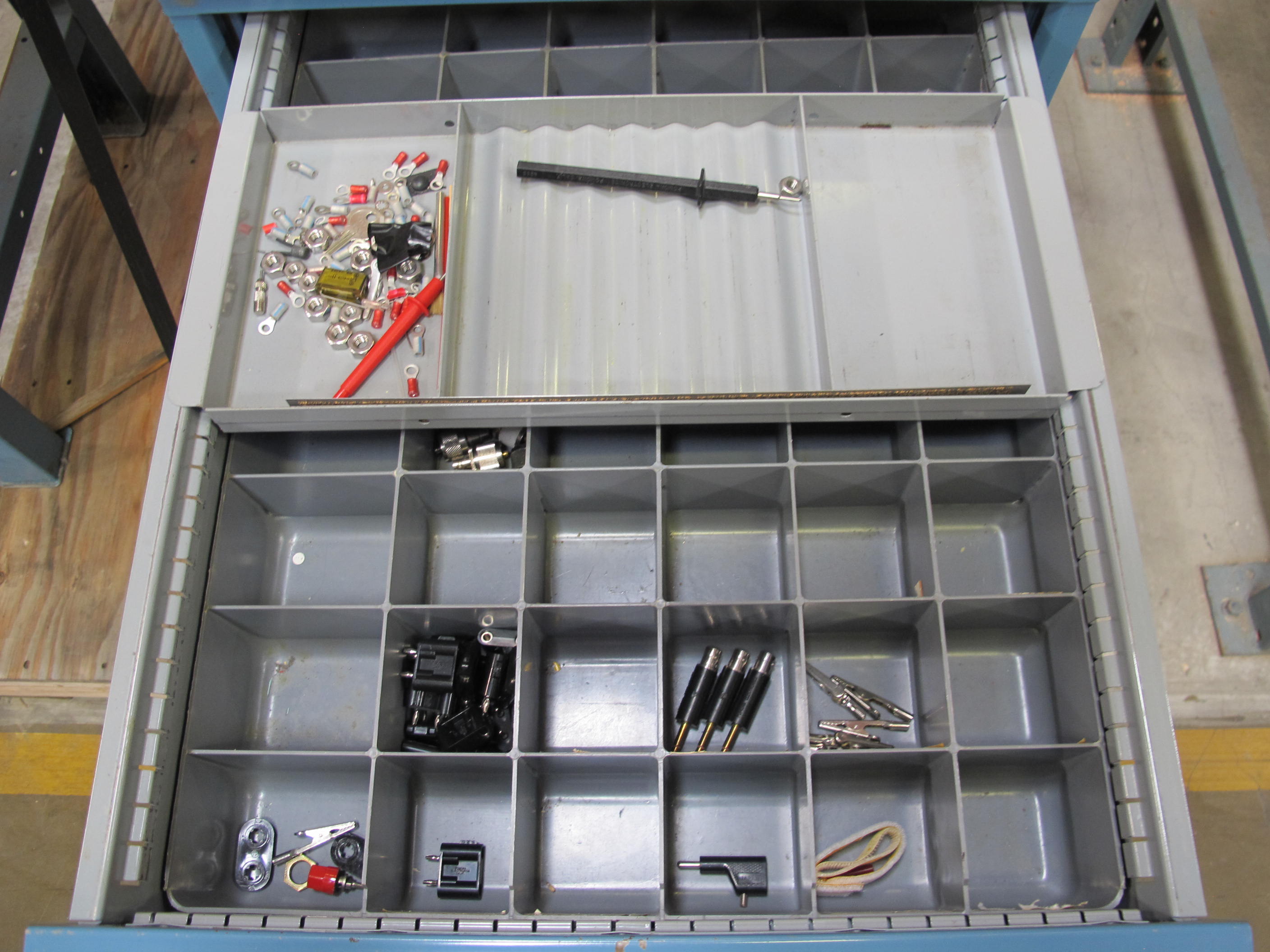 LISTA INDUSTRIAL WORK DESK, BUTCHER BLOCK TABLE TOP 48"L X 30"W, 4 DRAWER CABINET WITH CONTENTS TO INCLUDE: ELECTRIC CONNECTORS, CABLES, TEST WIRING . LOADING & HANDLING $15-1674
