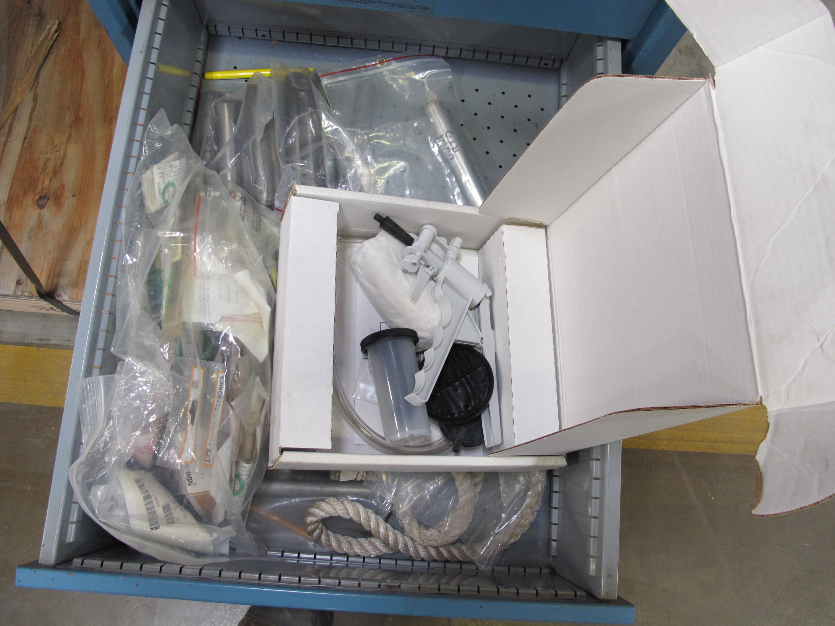 LISTA INDUSTRIAL WORK DESK, BUTCHER BLOCK TABLE TOP 48"L X 30"W, 4 DRAWER CABINET WITH CONTENTS TO INCLUDE: ELECTRIC CONNECTORS, CABLES, TEST WIRING . LOADING & HANDLING $15-1674