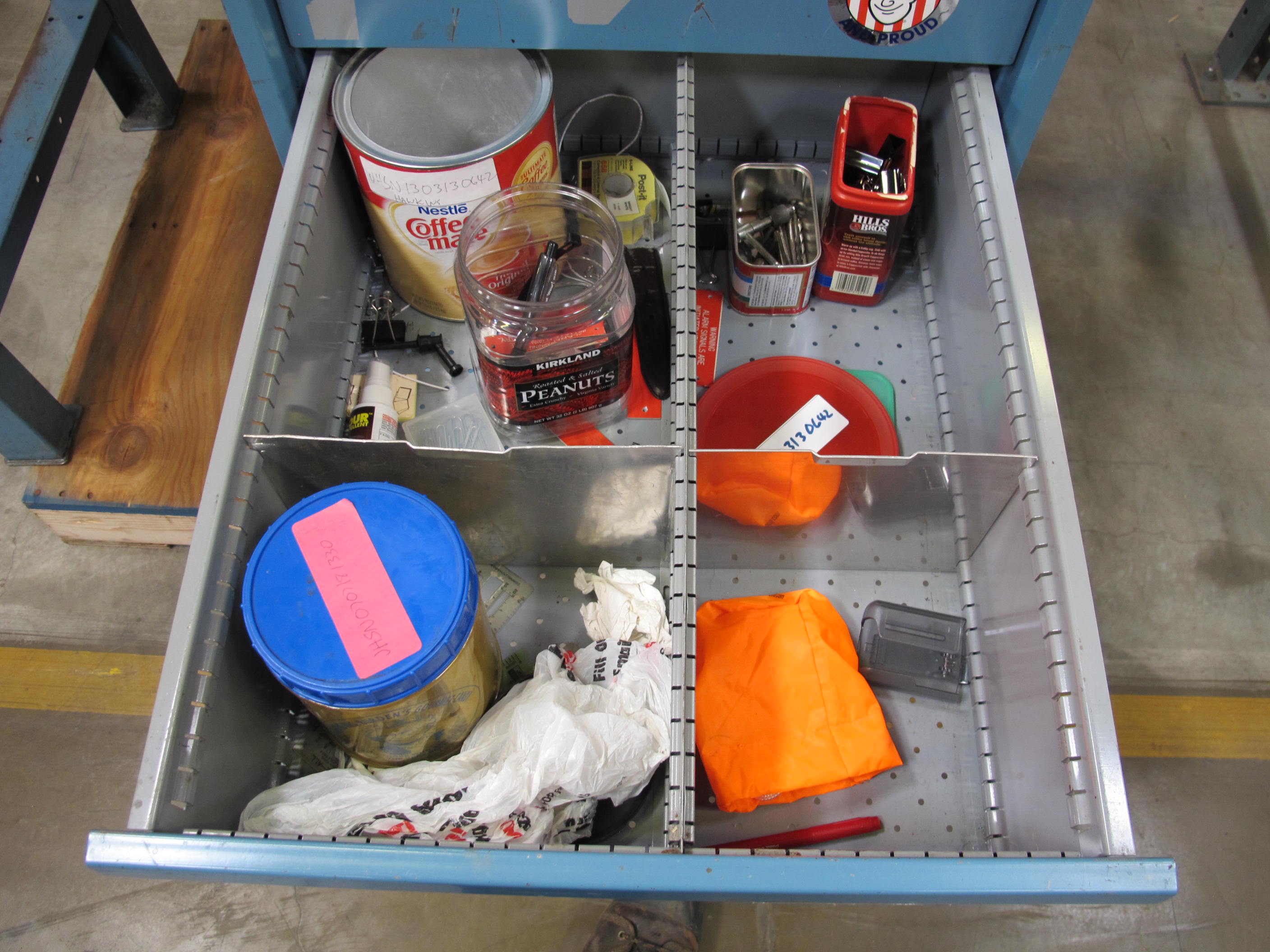 LISTA INDUSTRIAL WORK DESK, BUTCHER BLOCK TABLE TOP 48"L X 30"W, SHELF, 4 DRAWER CABINET WITH CONTENTS TO INCLUDE: MISC. OFFICE SUPPLIES, CABLES, AND EAR MUFFS. LOADING & HANDLING $15-1675