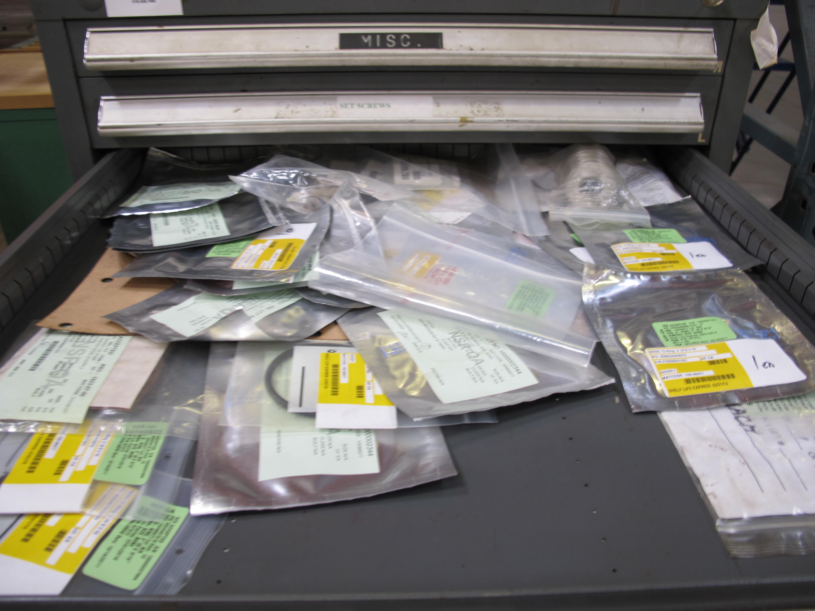 STANLEY VIDMAR 13 DRAWER CABINET WITH CONTENTS TO INCLUDE: PUMP FILTERS, GASKETS, BRASS ITEMS, PLUNGER. LOADING & HANDLING $15-1684