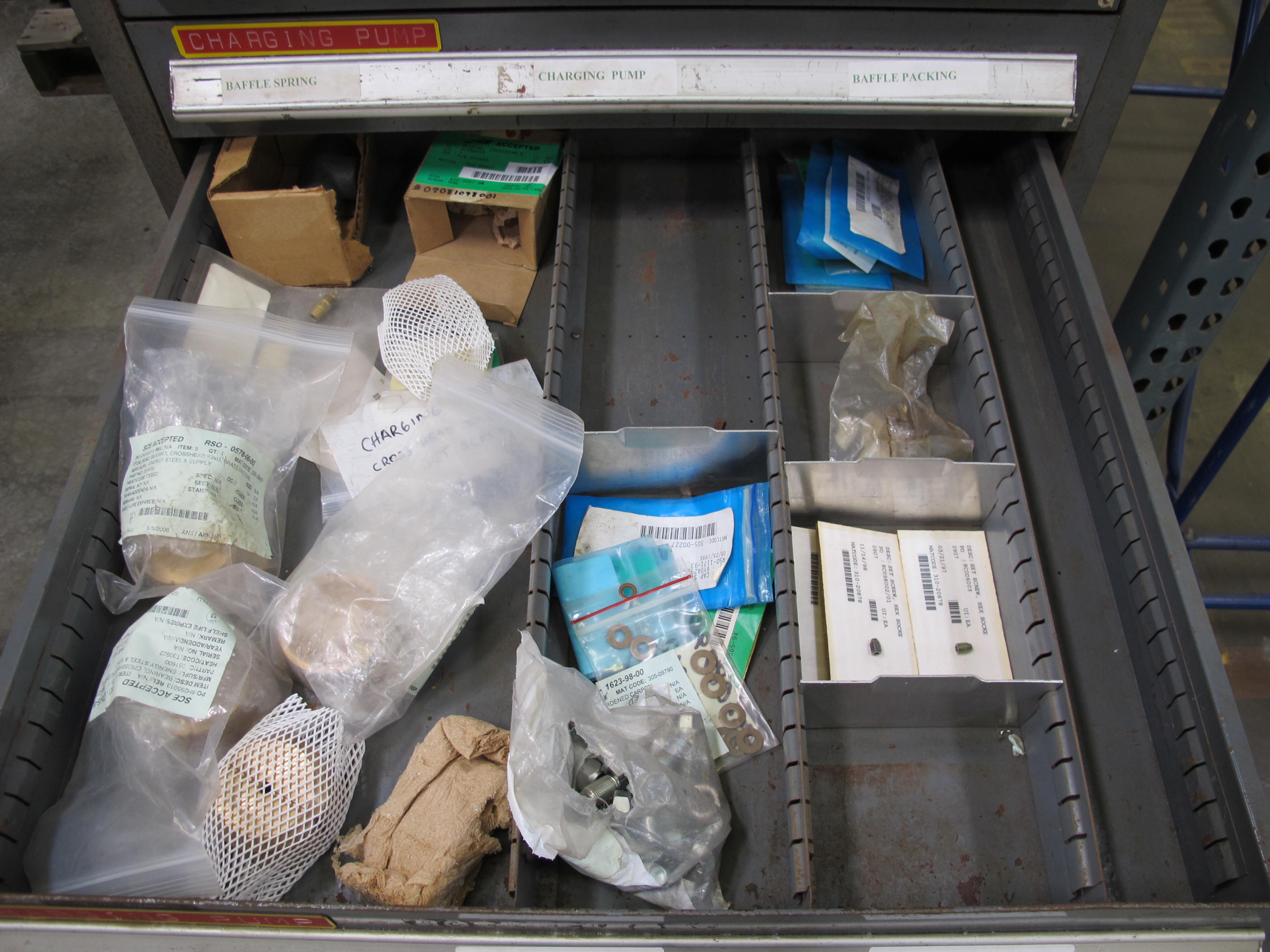 STANLEY VIDMAR 13 DRAWER CABINET WITH CONTENTS TO INCLUDE: PUMP FILTERS, GASKETS, BRASS ITEMS, PLUNGER. LOADING & HANDLING $15-1684