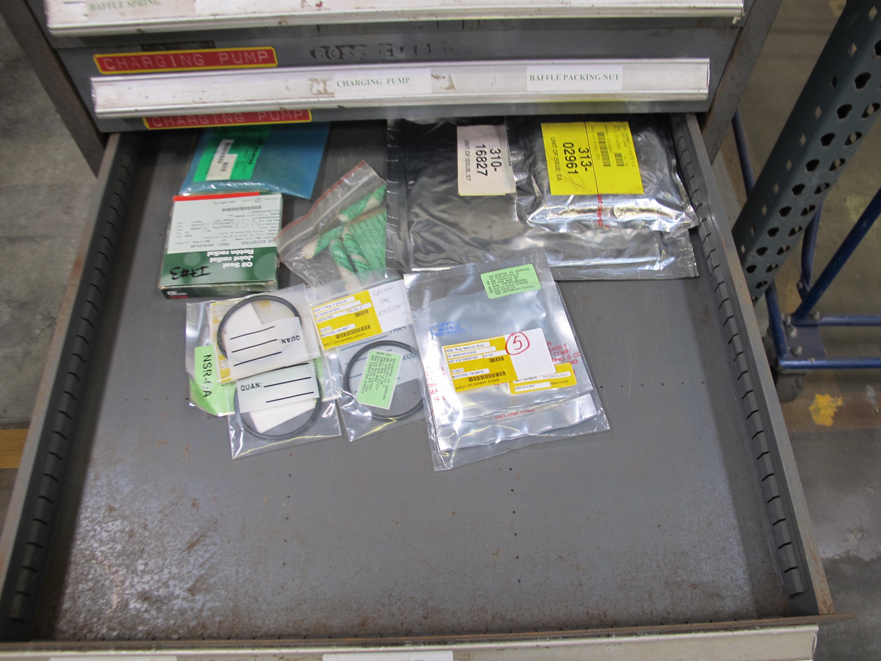 STANLEY VIDMAR 13 DRAWER CABINET WITH CONTENTS TO INCLUDE: PUMP FILTERS, GASKETS, BRASS ITEMS, PLUNGER. LOADING & HANDLING $15-1684