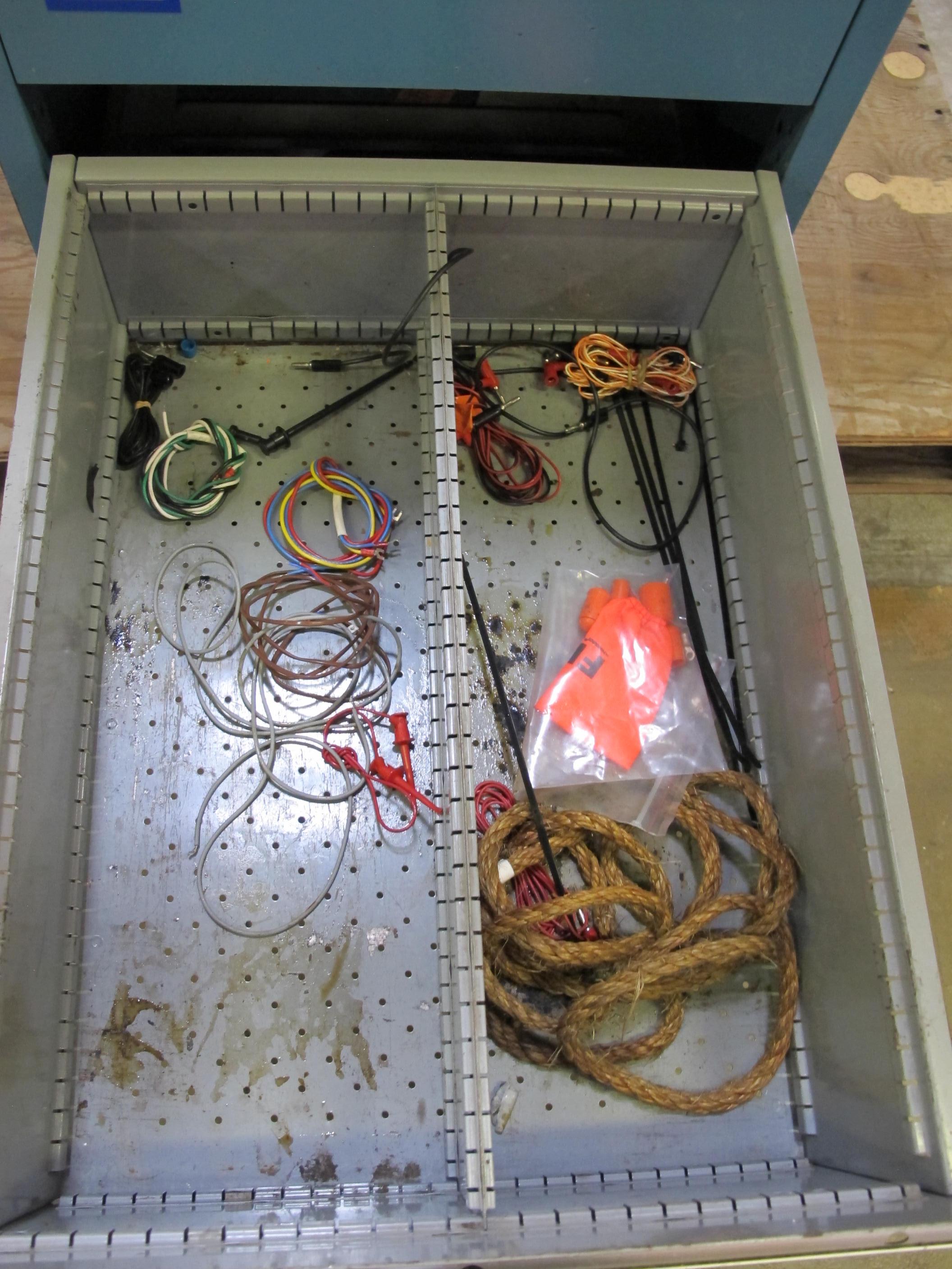 LISTA INDUSTRIAL WORK DESK, BUTCHER BLOCK TABLE TOP 60"L X 30"W, 5 DRAWER CABINET WITH CONTENTS TO INCLUDE: MISC. WIRES, TAPE, PRECISION SCREWDRIVERS. LOADING & HANDLING $15-1686