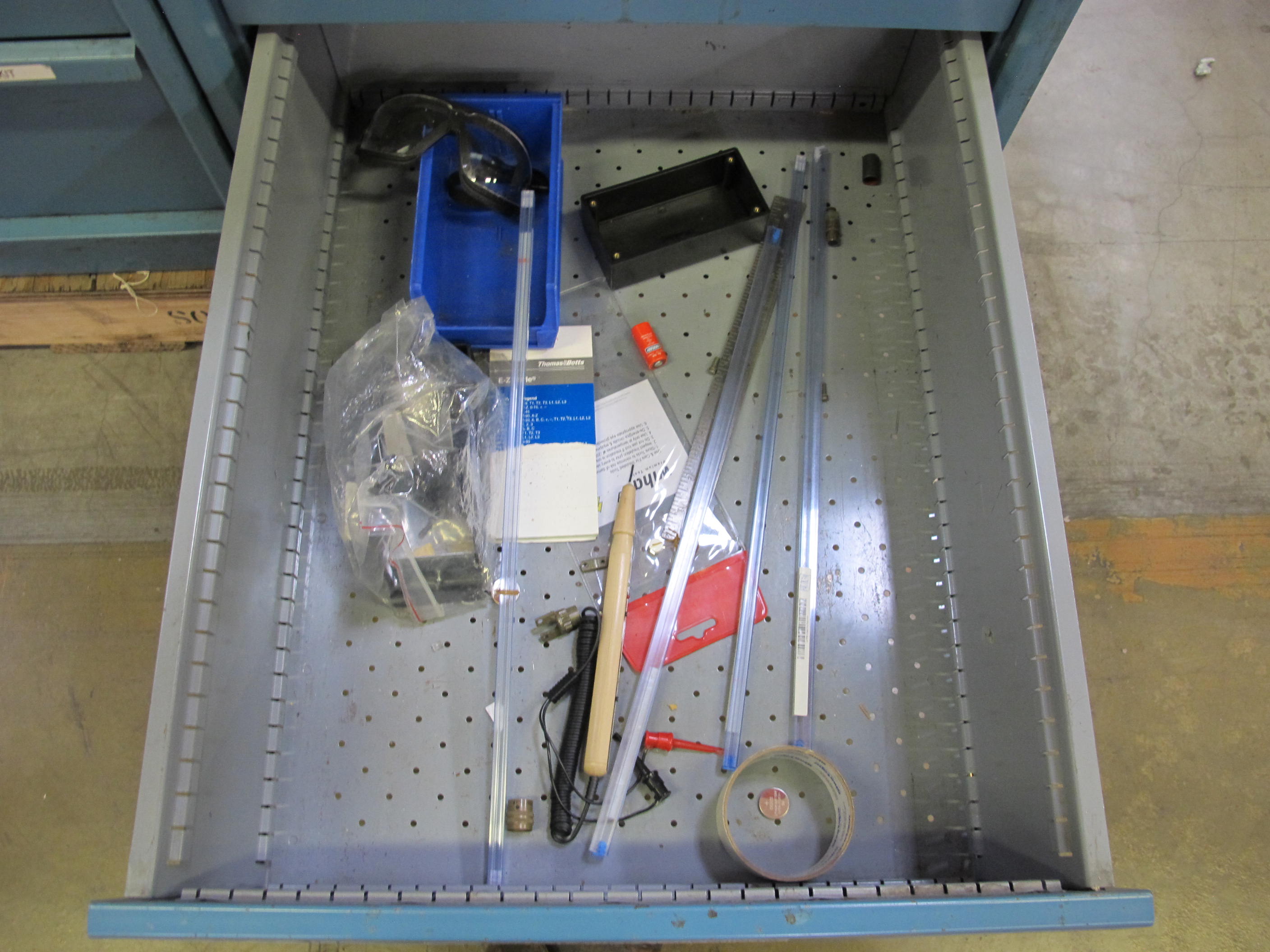 LOT TO INCLUDE: BUTCHER BLOCK TABLE TOP 72"L X 30"W, (2) LISTA 4 DRAWER CABINETS WITH CONTENTS TO INCLUDE: MISC. ELECTRIC CONNECTORS, ELECTRIC TESTING EQUIPMENT, OFFICE SUPPLIES. LOADING & HANDLING $15-1689