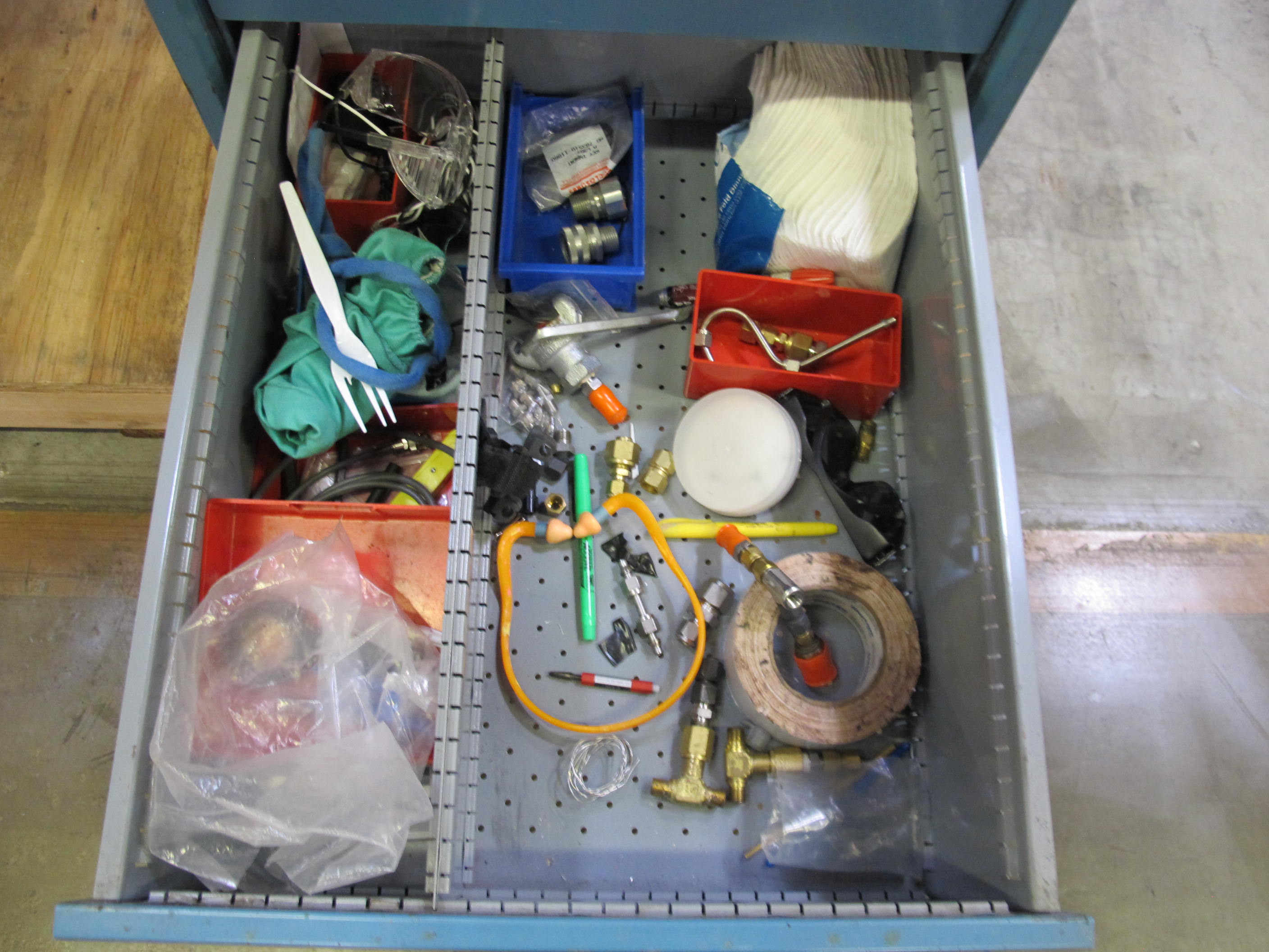 LISTA INDUSTRIAL WORK DESK, BUTCHER BLOCK TABLE TOP 48"L X 30"W, SHELF, 4 DRAWER CABINET WITH CONTENTS TO INCLUDE: MISC. OFFICE SUPPLIES, CABLES, SAFETY GLASSES, ELECTRIC TESTING WIRE. LOADING & HANDLING $15-1692