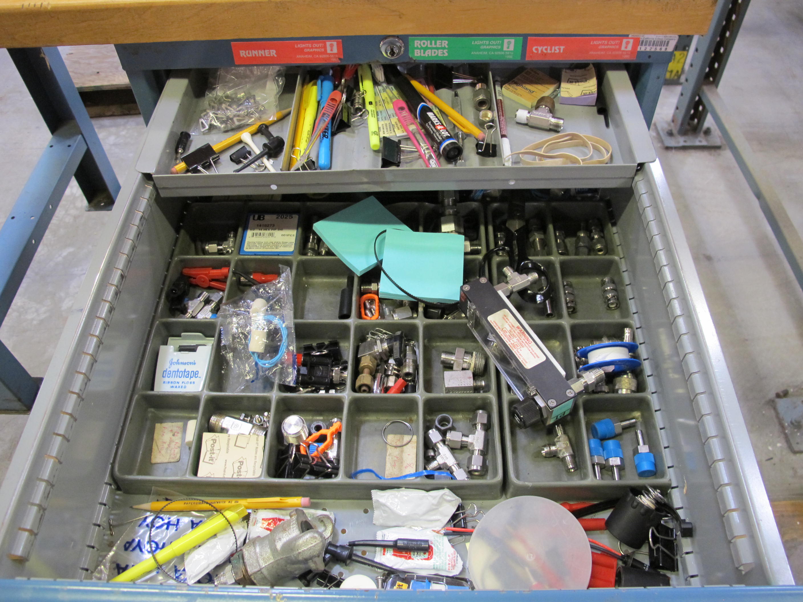 LISTA INDUSTRIAL WORK DESK, BUTCHER BLOCK TABLE TOP 48"L X 30"W, SHELF, 4 DRAWER CABINET WITH CONTENTS TO INCLUDE: FITTINGS, MISC. OFFICE SUPPLIES, WIRING. LOADING & HANDLING $15-1695