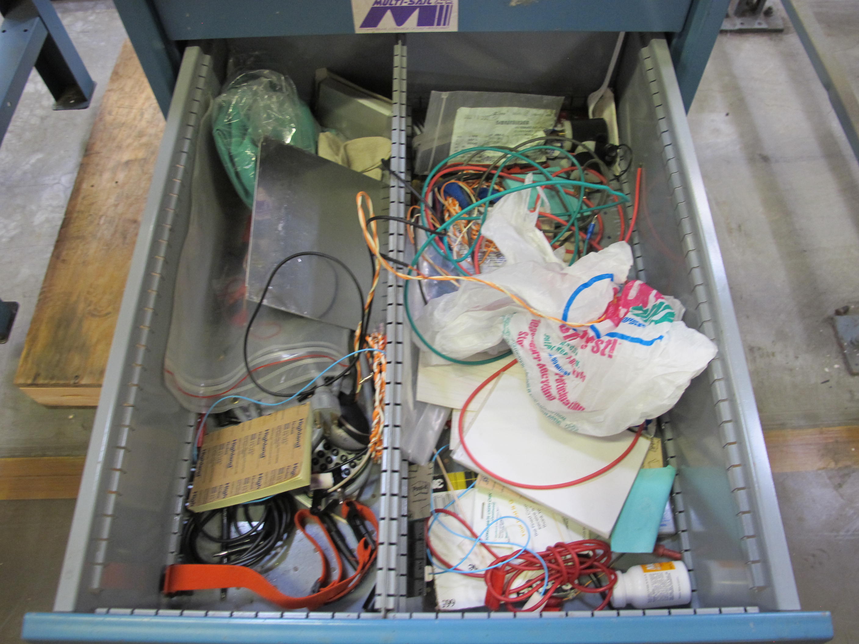 LISTA INDUSTRIAL WORK DESK, BUTCHER BLOCK TABLE TOP 48"L X 30"W, SHELF, 4 DRAWER CABINET WITH CONTENTS TO INCLUDE: FITTINGS, MISC. OFFICE SUPPLIES, WIRING. LOADING & HANDLING $15-1695