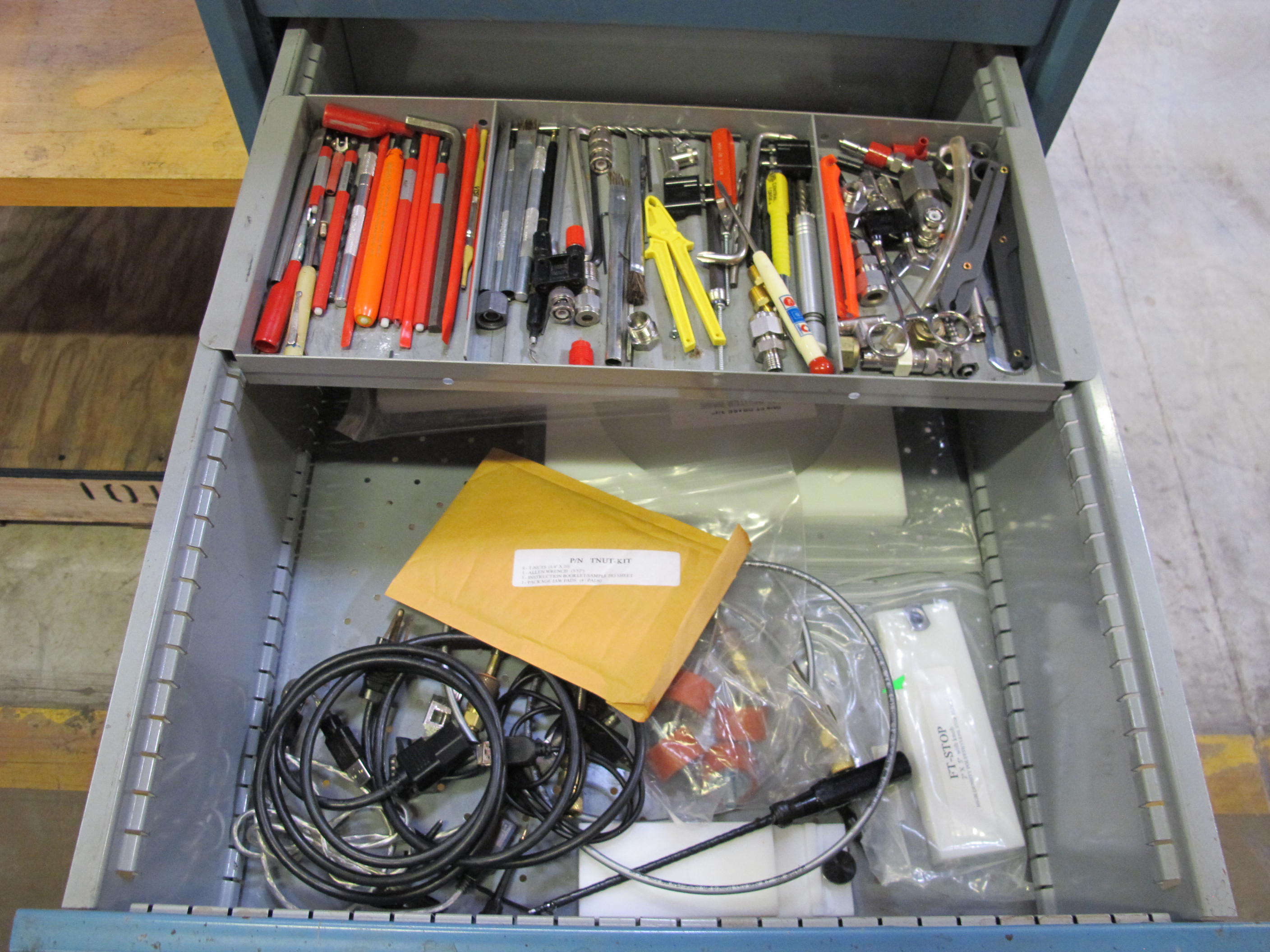 LISTA INDUSTRIAL WORK DESK, BUTCHER BLOCK TABLE TOP 48"L X 30"W, SHELF, 4 DRAWER CABINET WITH CONTENTS TO INCLUDE: MISC. OFFICE SUPPLIES, WIRING, BRUSH. LOADING & HANDLING $15-1697