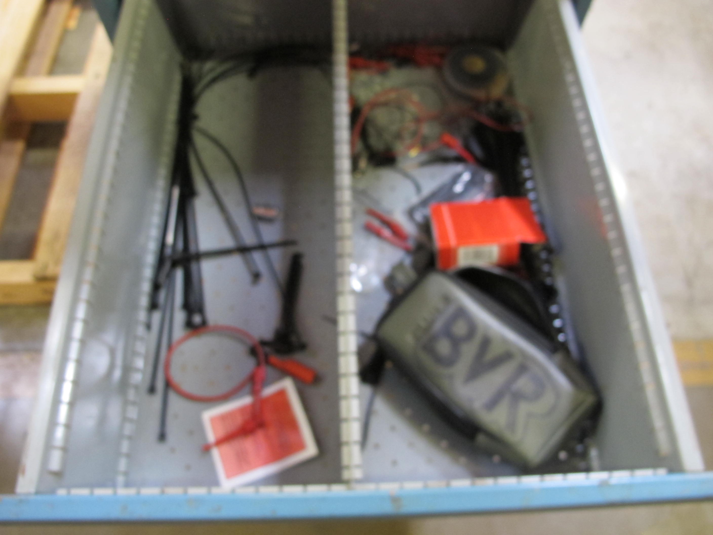 LISTA INDUSTRIAL WORK DESK, BUTCHER BLOCK TABLE TOP 48"L X 30"W, 4 DRAWER CABINET WITH CONTENTS TO INCLUDE: EAR PLUGS, MISC. OFFICE SUPPLIES, TEST WIRING, TUBING. LOADING & HANDLING $15-1699