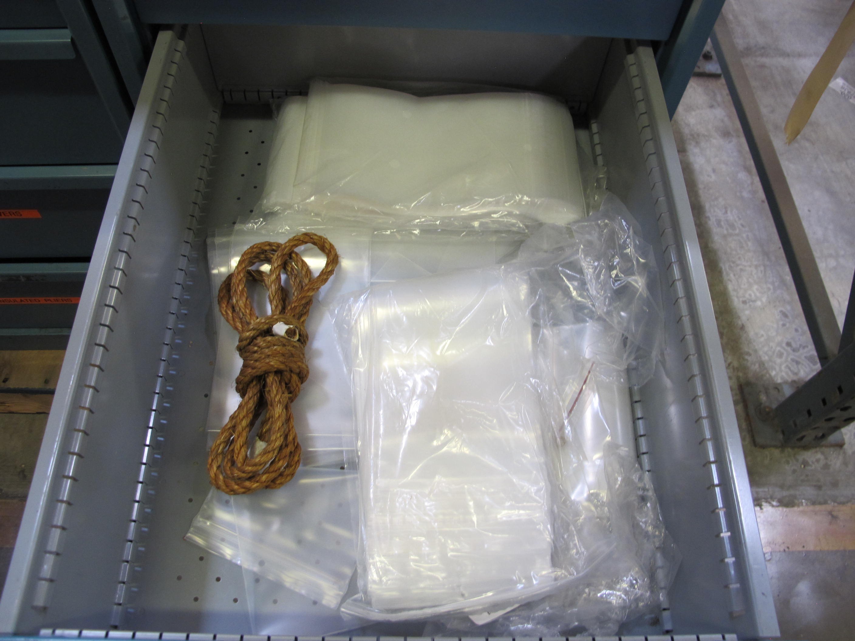 LOT TO INCLUDE: BUTCHER BLOCK TABLE TOP 96"L X 30"W, (2) LISTA 4 DRAWER CABINETS WITH CONTENTS. LOADING & HANDLING $15-1701