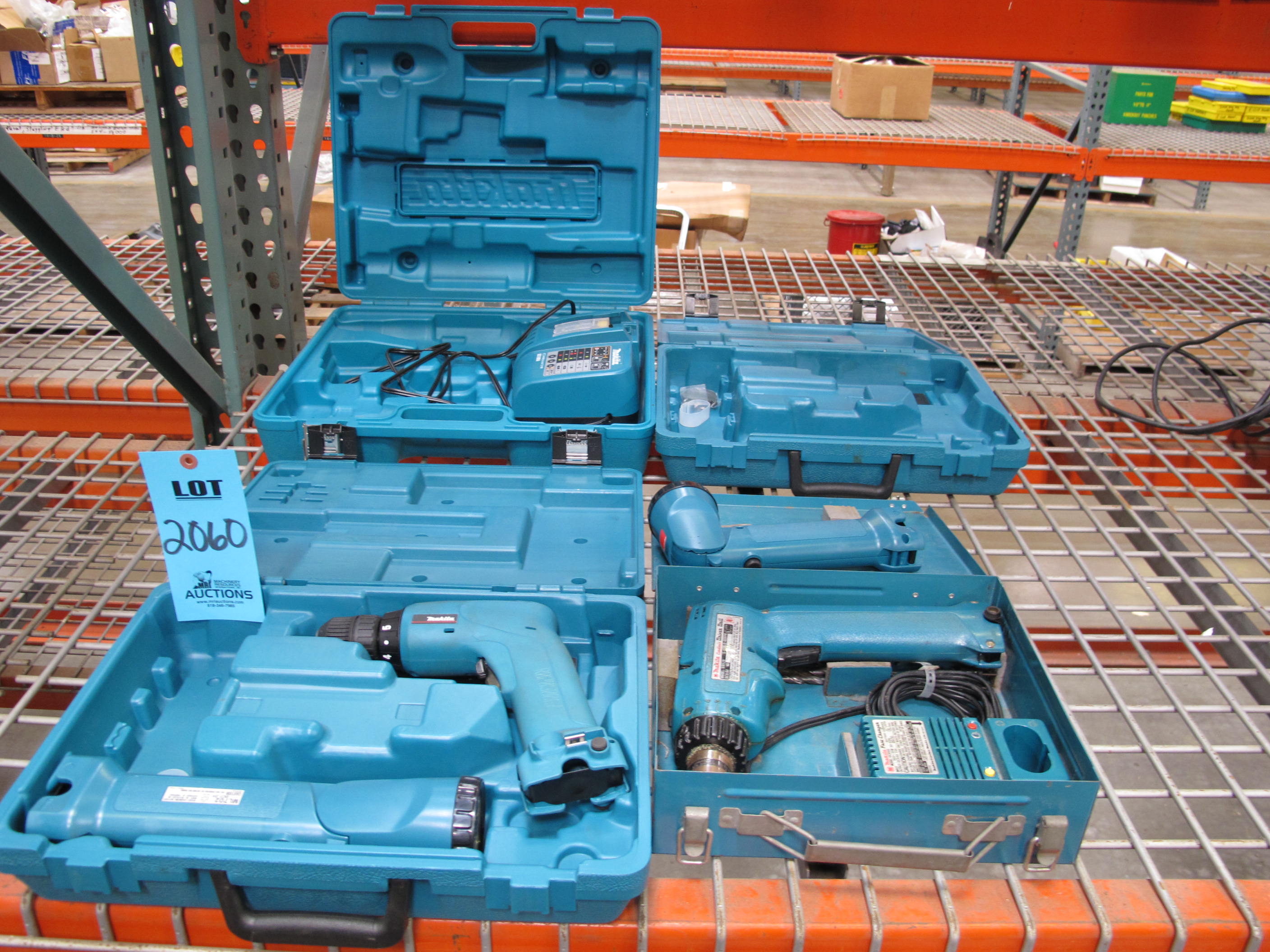 MAKITA DRILL SET TO INCLUDE: (1) DRIVER DRILL, MODEL NUMBER 6093D, 0-1100 RPM, (1) DRILL, MODEL NUMBER 6019D, (2) ADJUSTABLE TIP FLASHLIGHTS, MODEL ML702, (1) BATTERY CHARGER, MODEL NUMBER DC18RA, (1) FAST CHARGER DC9100. *BATTERIES NOT INCLUDED*-2060