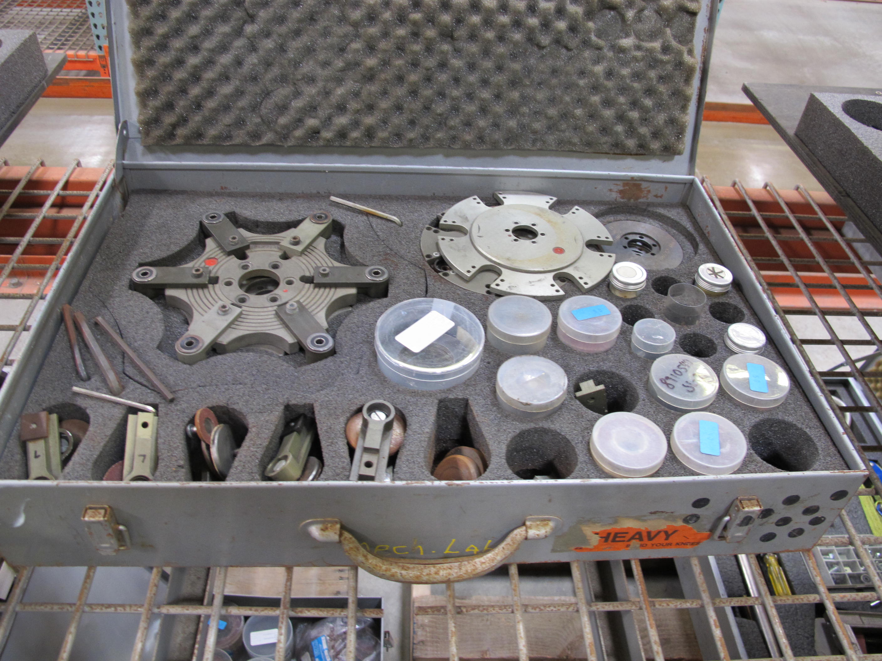 LOT TO INCLUDE: (2) EFCO PORTABLE GATE VALVE GRINDING/LAPPING MACHINE, MODEL SL-2, MACHINE INCLUDES: MACHINE ARM WITH DRIVE MOTOR, ROCKER WITH SEATING FOR MACHINE ARM, BASEPLATE FOR MOUNTING ON VALVE HOUSINGS, CLAMPING COLLARS, GRINDING AND LAPPING TOOLS, FASTENING SCREW CLAMPS, AND INSTRUCTION BOOKLET IN PORTABLE CASE, (2) ASSORTED ABRASIVE DISCS, VARIED SIZES, IN PORTABLE CASE, (5) EFCO TOOLING IN PORTABLE TOOLING-2095