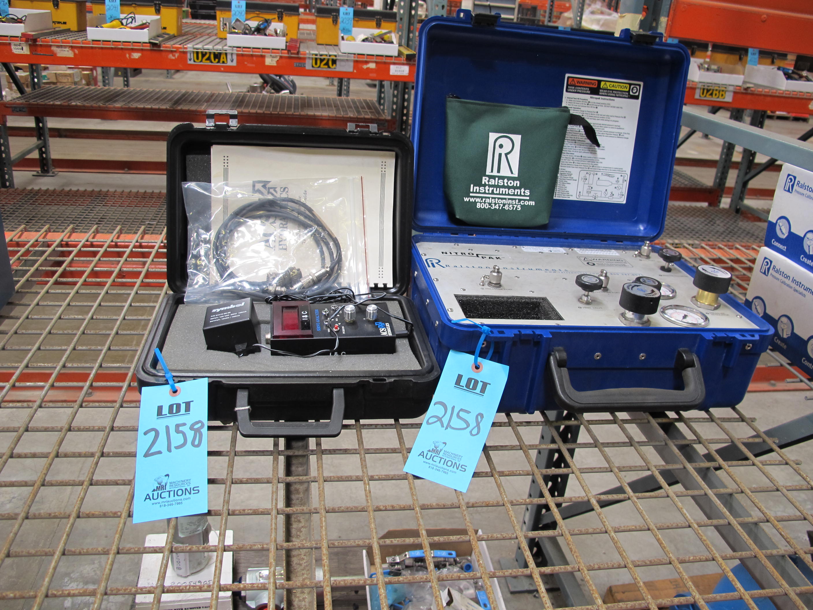 LOT TO INCLUDE: (1) ACS HYDRAULICS SERVO ANALYZER, WITH POWER SUPPLY, TEST CABLE, INSTRUCTION BOOKLET, AND PORTABLE CASE, (1) RALSTON INSTRUMENTS NITROPAK, MODEL NUMBER NPAK-0000-0-0, WITH ACCESSORY BAG-2158
