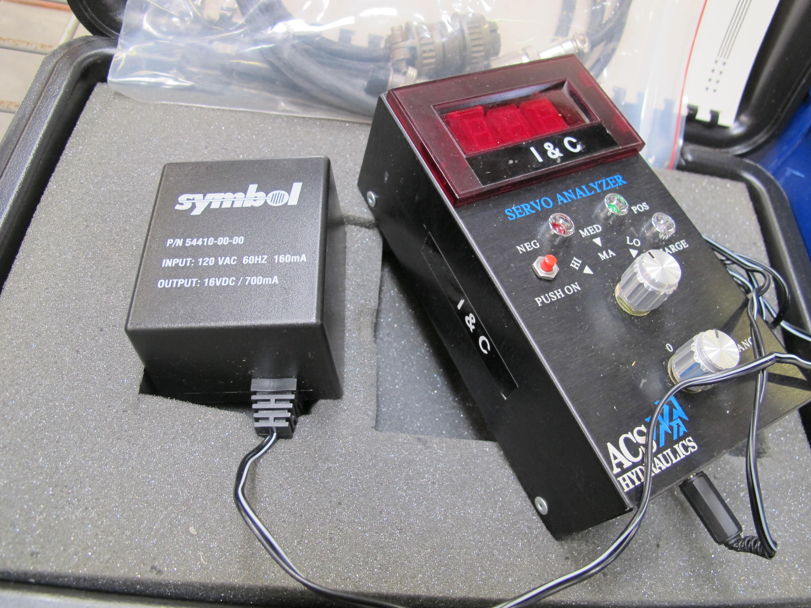 LOT TO INCLUDE: (1) ACS HYDRAULICS SERVO ANALYZER, WITH POWER SUPPLY, TEST CABLE, INSTRUCTION BOOKLET, AND PORTABLE CASE, (1) RALSTON INSTRUMENTS NITROPAK, MODEL NUMBER NPAK-0000-0-0, WITH ACCESSORY BAG-2158