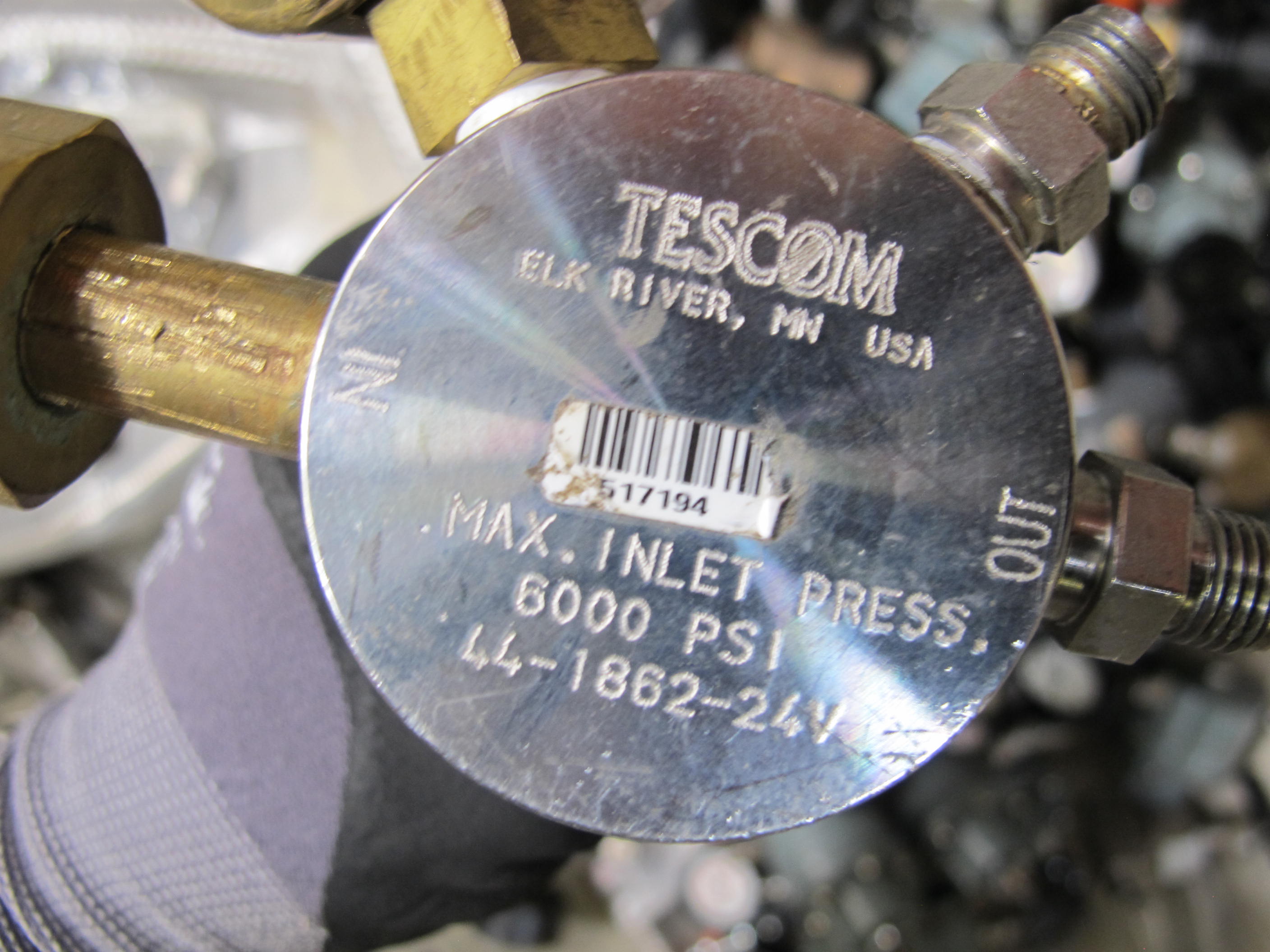 PALLETAINER LOT TO INCLUDE: LARGE QUANTITY OF SIEMENS, NULLMATIC, FAIRCHILD, TESCOM, EST, AND FISHER PRESSURE REGULATORS, GAUGES, AND FITTINGS,  SS BRAIDED FLEX PIPING-2169