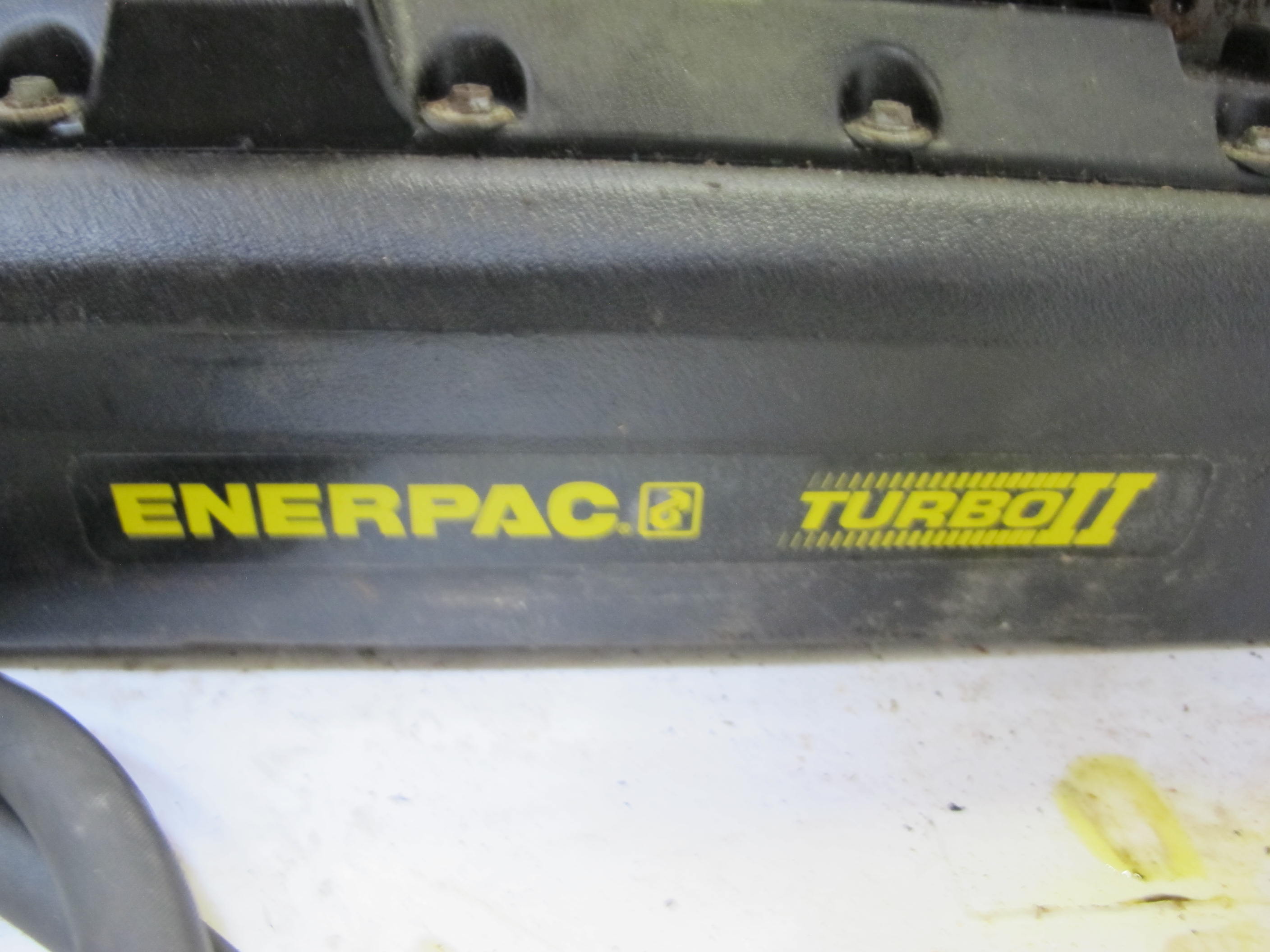 LOT TO INCLUDE: (1) ENERPAC TURBO 2, (1) POWER TEAM HYDRAULIC PUMP, MODEL PE172, 10000 PSI, (1) VAREC AUTOMATIC TANK GAUGE, (1 CRATE) MISC. PARTS-2186
