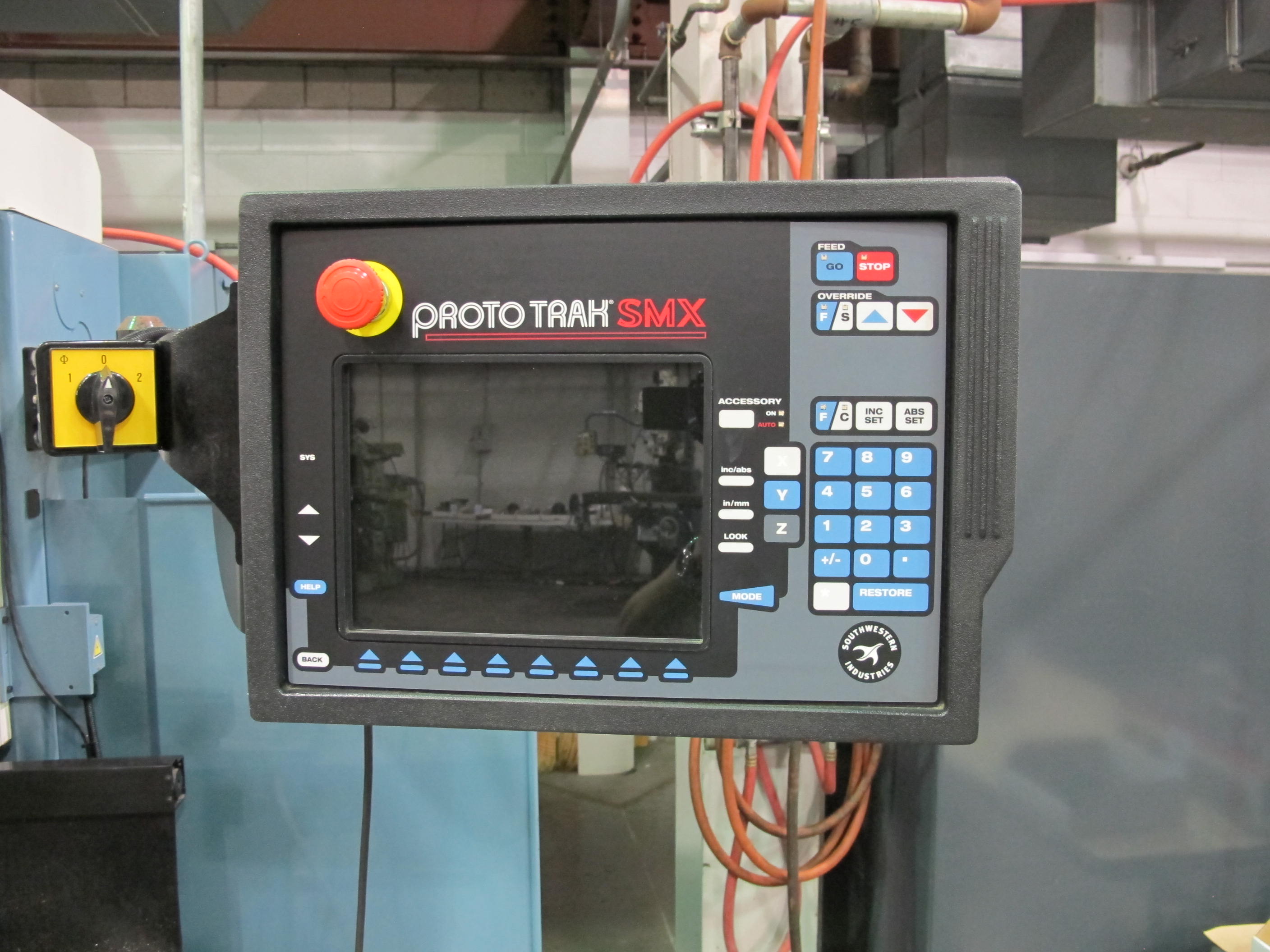 TRAK FHM 7 CNC BED MILL, TRAVELS: X-60" X Y-23" X Z-20.5", TABLE SIZE: 76" X 14", 40 TAPER SPINDLE, 200-5000 RPM, PROTO TRAK SMX CNC CONTROL, 7.5 HP, S/N 074CY15902 (T-10) LOADING & HANDLING FEE $500-258