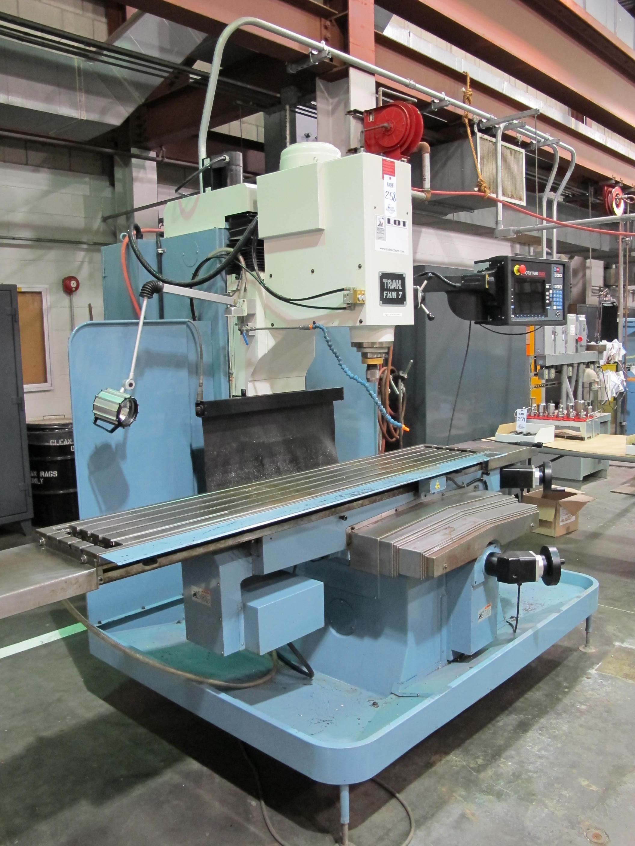 TRAK FHM 7 CNC BED MILL, TRAVELS: X-60" X Y-23" X Z-20.5", TABLE SIZE: 76" X 14", 40 TAPER SPINDLE, 200-5000 RPM, PROTO TRAK SMX CNC CONTROL, 7.5 HP, S/N 074CY15902 (T-10) LOADING & HANDLING FEE $500-258