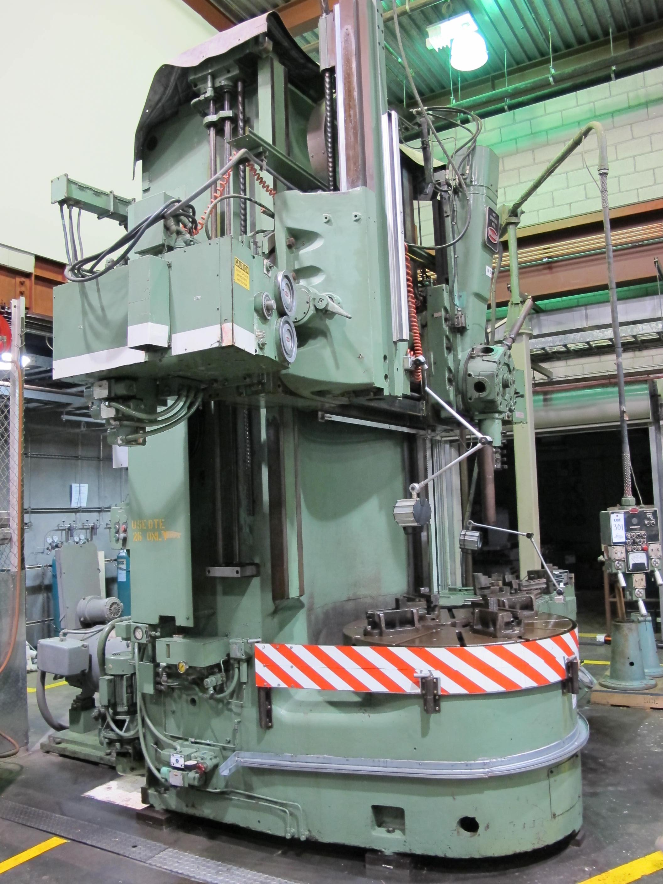 1988 BULLARD DYNATROL VERTICAL HIGH COLUMN TURRET LATHE, 46" ROTARY 4-JAW POWER CHUCK, MAX TURNING DIAMETER W/SIDE HEAD: 58", MAX TURNING HEIGHT UNDER RAIL: 64", 5-POSITION SWIVEL HEAD, SIDE HEAD, TWO RANGE HEAD STOCK, SCAN-O MATIC TRACER, PENDANT CONTROL, 50 HP, ACCU-RITE DRO, S/N 33056 (T-10) LOADING & HANDLING FEE $8,500-301