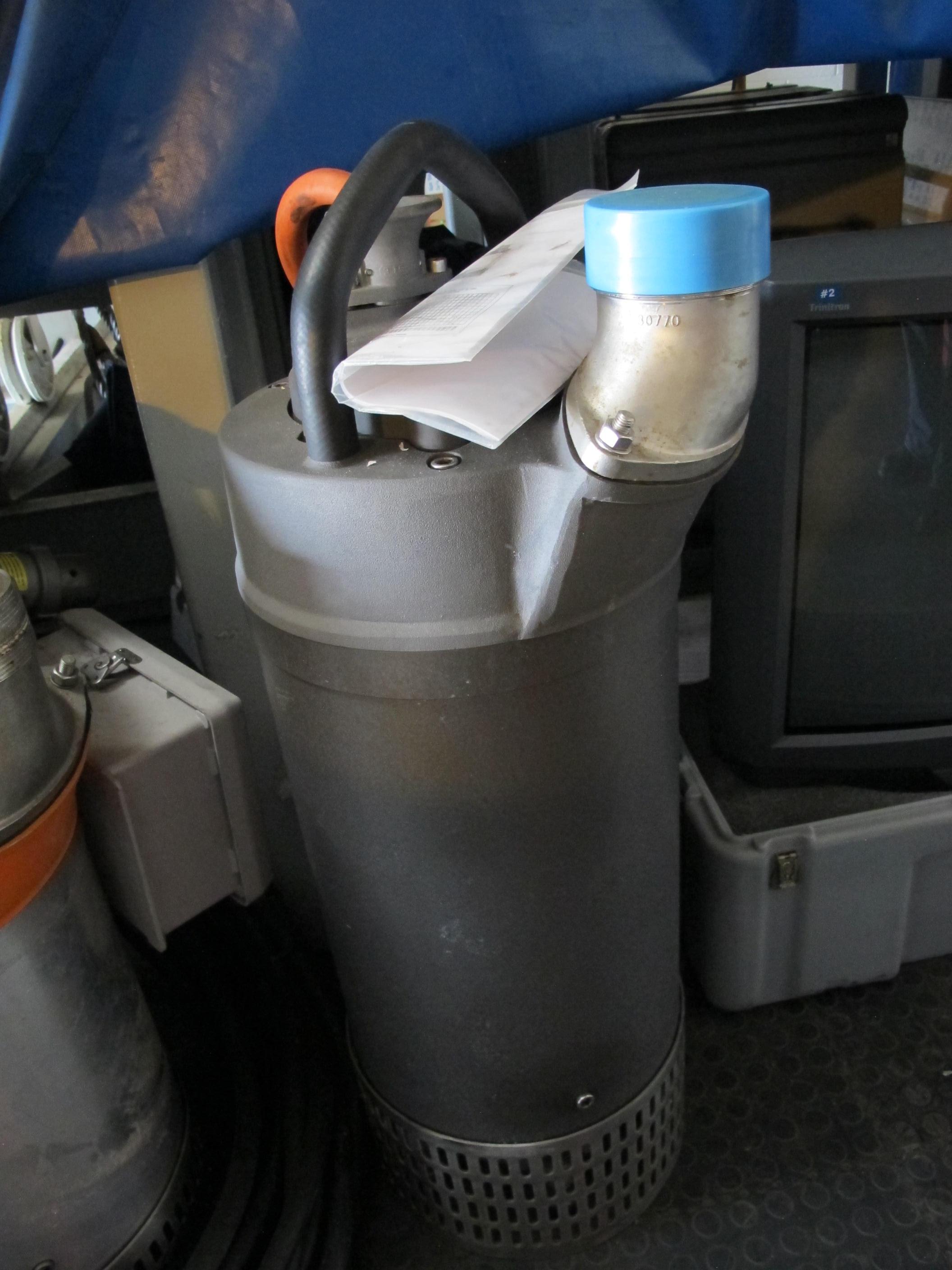 LOT (2) SUMP PUMPS (T-10) LOADING & HANDLING FEE $25-727