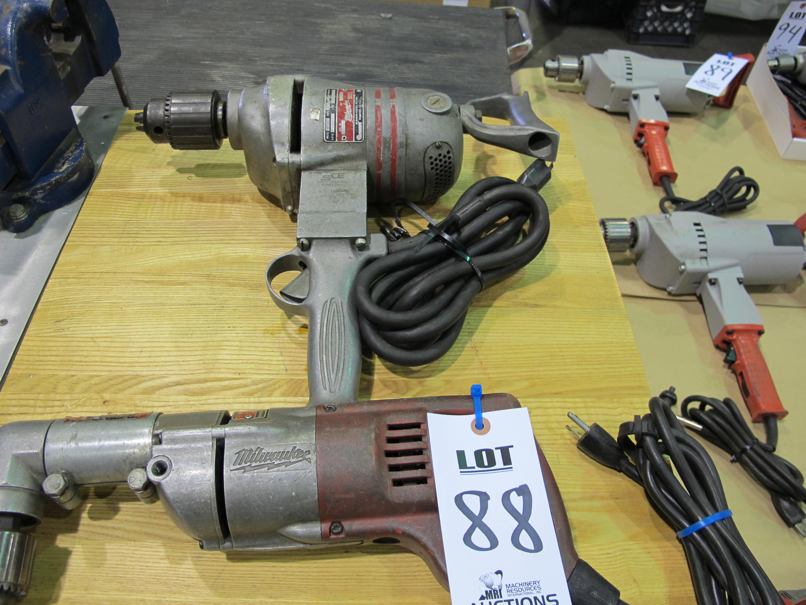 LOT (2) MILWAUKEE ASST'D ELECTRIC HAND DRILLS (T-10) LOADING & HANDLING FEE $10-88