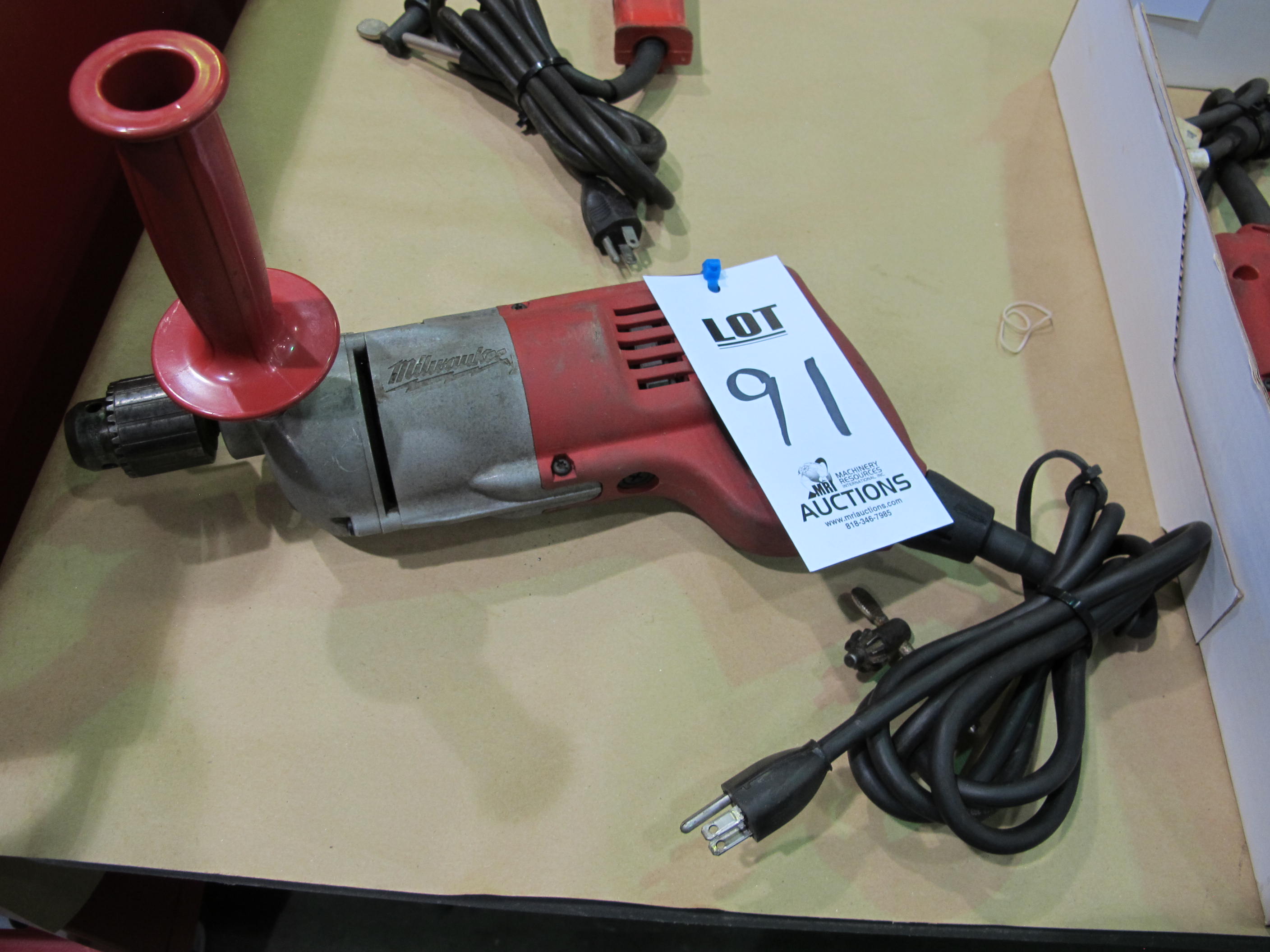 MILWAUKEE CAT NO 1007-1 ELECTRIC HAND DRILL S/N 34791 (T-10) LOADING & HANDLING FEE $10-91
