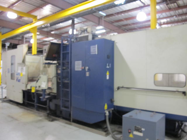 2001 VIPER V-4000 GXT VERTICAL BRIDGE MILL, TRAVELS: X-157.5", Y-77.60", Z-42.13", SPINDLE END TO COLUMN: 13.66", DISTANCE BETWEEN COLUMNS: 86.6" TABLE SIZE: 161.4" X 72", 24,250 TABLE LOAD, 6,000 RPM SPINDLE, CT 50 TAPER SPINDLE, 35 HP UPGRADE, SIDE MOUNT 60 ATC, FANUC 18MC CNC CONTROL, FANUC HPCC.64BIT RISC PR, COOL JET CHIP BLASTER, S/N 3733 (G-49) LOADING & HANDLING FEE $17,500-2187