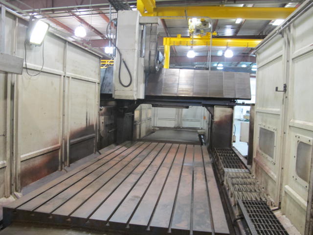 2001 VIPER V-4000 GXT VERTICAL BRIDGE MILL, TRAVELS: X-157.5", Y-77.60", Z-42.13", SPINDLE END TO COLUMN: 13.66", DISTANCE BETWEEN COLUMNS: 86.6" TABLE SIZE: 161.4" X 72", 24,250 TABLE LOAD, 6,000 RPM SPINDLE, CT 50 TAPER SPINDLE, 35 HP UPGRADE, SIDE MOUNT 60 ATC, FANUC 18MC CNC CONTROL, FANUC HPCC.64BIT RISC PR, COOL JET CHIP BLASTER, S/N 3733 (G-49) LOADING & HANDLING FEE $17,500-2187