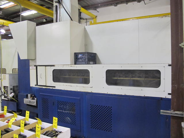 2001 VIPER V-4000 GXT VERTICAL BRIDGE MILL, TRAVELS: X-157.5", Y-77.60", Z-42.13", SPINDLE END TO COLUMN: 13.66", DISTANCE BETWEEN COLUMNS: 86.6" TABLE SIZE: 161.4" X 72", 24,250 TABLE LOAD, 6,000 RPM SPINDLE, CT 50 TAPER SPINDLE, 35 HP UPGRADE, SIDE MOUNT 60 ATC, FANUC 18MC CNC CONTROL, FANUC HPCC.64BIT RISC PR, COOL JET CHIP BLASTER, S/N 3733 (G-49) LOADING & HANDLING FEE $17,500-2187