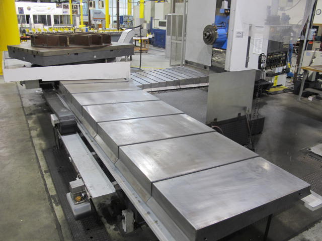 2003 SNK IKEGAI TABLE TYPE HORIZONTAL BORING MILL, NB 130P E3.5, 5.118" SPINDLE DIAMETER, TRAVELS: X-137", Y-98", Z-63", W-27.5", TABLE SIZE: 70.86" X 63", ROTARY TABLE CAPACITY: 22.045 LBS, 2,500 RPM SPINDLE SPEED, CAT 50 TAPER SPINDLE, COOLANT THRU SPINDLE, RIGID TAPPING, 35 HP, 60 ATC, COOL POWER, FANUC 16iMB CNC CONTROL, 5 AXIS SIMULTANEOUS CONTROL, STEEL WAY COVERS, CHIP CONVEYOR, S/N NB4002 (G-49) LOADING & HANDLING FEE $17,500-2188