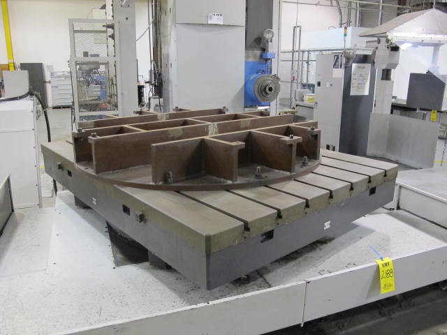 2003 SNK IKEGAI TABLE TYPE HORIZONTAL BORING MILL, NB 130P E3.5, 5.118" SPINDLE DIAMETER, TRAVELS: X-137", Y-98", Z-63", W-27.5", TABLE SIZE: 70.86" X 63", ROTARY TABLE CAPACITY: 22.045 LBS, 2,500 RPM SPINDLE SPEED, CAT 50 TAPER SPINDLE, COOLANT THRU SPINDLE, RIGID TAPPING, 35 HP, 60 ATC, COOL POWER, FANUC 16iMB CNC CONTROL, 5 AXIS SIMULTANEOUS CONTROL, STEEL WAY COVERS, CHIP CONVEYOR, S/N NB4002 (G-49) LOADING & HANDLING FEE $17,500-2188