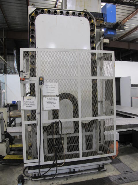 2003 SNK IKEGAI TABLE TYPE HORIZONTAL BORING MILL, NB 130P E3.5, 5.118" SPINDLE DIAMETER, TRAVELS: X-137", Y-98", Z-63", W-27.5", TABLE SIZE: 70.86" X 63", ROTARY TABLE CAPACITY: 22.045 LBS, 2,500 RPM SPINDLE SPEED, CAT 50 TAPER SPINDLE, COOLANT THRU SPINDLE, RIGID TAPPING, 35 HP, 60 ATC, COOL POWER, FANUC 16iMB CNC CONTROL, 5 AXIS SIMULTANEOUS CONTROL, STEEL WAY COVERS, CHIP CONVEYOR, S/N NB4002 (G-49) LOADING & HANDLING FEE $17,500-2188