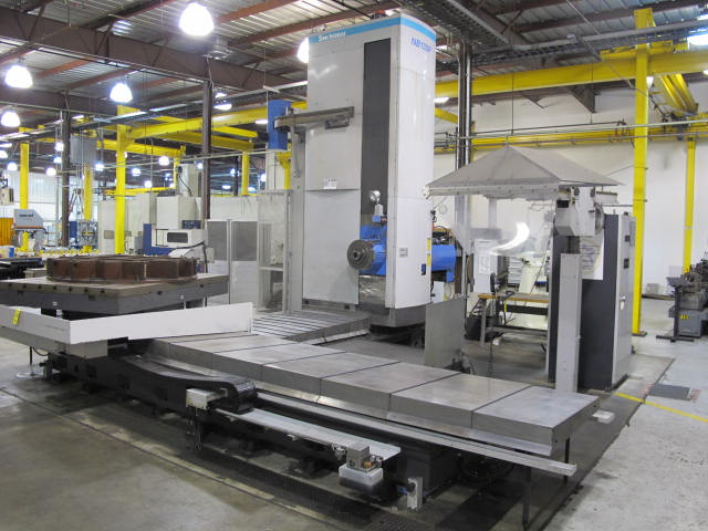 2003 SNK IKEGAI TABLE TYPE HORIZONTAL BORING MILL, NB 130P E3.5, 5.118" SPINDLE DIAMETER, TRAVELS: X-137", Y-98", Z-63", W-27.5", TABLE SIZE: 70.86" X 63", ROTARY TABLE CAPACITY: 22.045 LBS, 2,500 RPM SPINDLE SPEED, CAT 50 TAPER SPINDLE, COOLANT THRU SPINDLE, RIGID TAPPING, 35 HP, 60 ATC, COOL POWER, FANUC 16iMB CNC CONTROL, 5 AXIS SIMULTANEOUS CONTROL, STEEL WAY COVERS, CHIP CONVEYOR, S/N NB4002 (G-49) LOADING & HANDLING FEE $17,500-2188