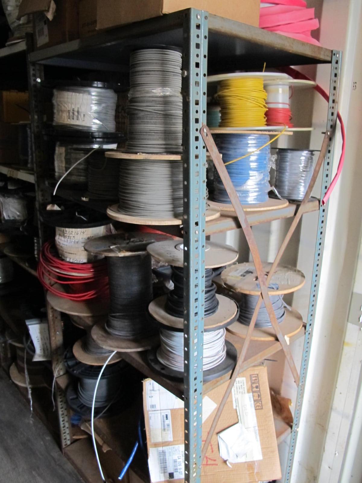 CONTENTS OF 8'X8'X20' STORAGE CONTAINER: "ELECTRICIANS DREAM II" LARGE QUANTITY OF: SPOOLS OF WIRE, COMMUNICATION CABLE, CLAMPS, SEALS, PLUGS, FITTINGS, LIGHTS, PLUS SO MUCH MORE. (G-20/#5) (TO BE PURCHASED ONLY BY AN INSURED BUYER, TO BE LOADED BY HAND. NO FORKLIFT USE ALLOWED.)-4408