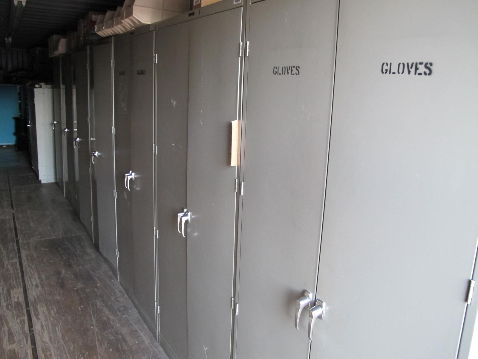 CONTENTS OF 8'X8'X20' STORAGE CONTAINER: TO INCLUDE PAINTING FINISHING AND SANDBLASTING SUPPLIES: VACUUM DISCS, GRINDING WHEELS, TAPE, CLEMCO CARTRIDGES, SPARE PARTS, SAFETY GLOVES, RESPIRATORS, SAND BLASTING MASKS, CHLORIDE ION FIELD TEST KITS, PLUS SO MUCH MORE (G-40/#11) (TO BE PURCHASED ONLY BY AN INSURED BUYER, TO BE LOADED BY HAND. NO FORKLIFT USE ALLOWED.)-4415