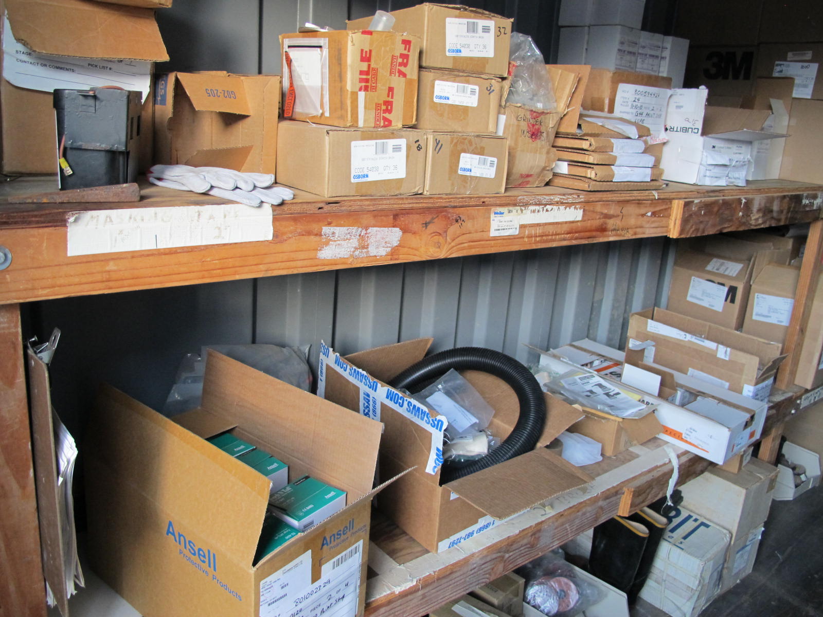 CONTENTS OF 8'X8'X20' STORAGE CONTAINER: TO INCLUDE PAINTING FINISHING AND SANDBLASTING SUPPLIES: VACUUM DISCS, GRINDING WHEELS, TAPE, CLEMCO CARTRIDGES, SPARE PARTS, SAFETY GLOVES, RESPIRATORS, SAND BLASTING MASKS, CHLORIDE ION FIELD TEST KITS, PLUS SO MUCH MORE (G-40/#11) (TO BE PURCHASED ONLY BY AN INSURED BUYER, TO BE LOADED BY HAND. NO FORKLIFT USE ALLOWED.)-4415