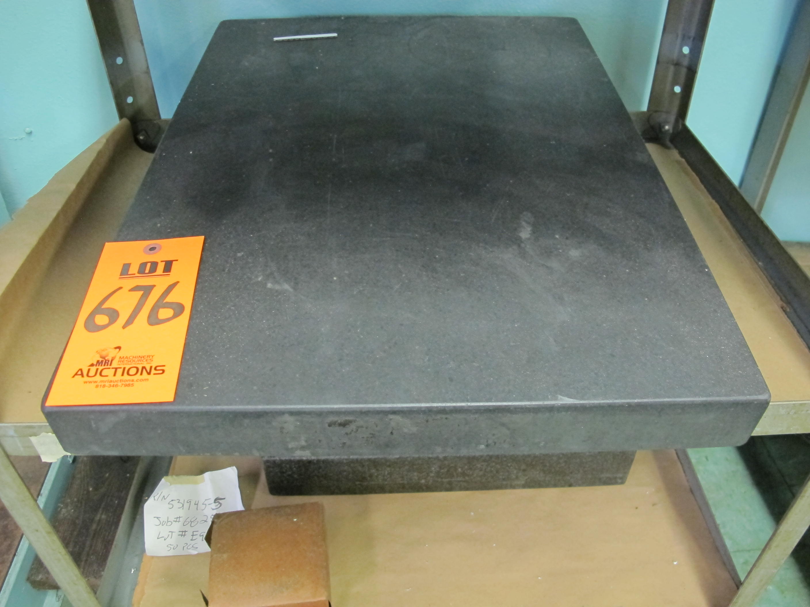 LOT TO INCLUDE: (1) GRANITE BLOCK, DIMENSIONS 18" X 12" X 2", (1) GRANITE BLOCK, DIMENSIONS 24" X 18" X 4"-676