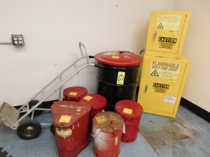 LOT OF MISC. SAFETY RELATED ITEMS TO INCLUDE: (2) FLAMMABLE LIQUID STORAGE CABINETS, (5) HAZARDOUS WASTE CANS, 55 GAL. WASTE DRUM W/JUSTRITE SAFETY DRUM COVER, DRUM DOLLY (SEE PHOTO)-121