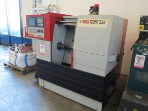 8.7" X 20.1" EMCO 345 CNC TURNING LATHE (GREAT CONDITION), FANUC 21T CNC CONTROL, 3J COLLET CHUCK, PROGRAMMABLE TAILSTOCK, BARFEED INTERFACE, COOLANT SYSTEM, SPLASH GUARDS, TRANSFORMER: INPUT 230.400.440.460, OUTPUT 400V. MACHINE IS SET UP 400V, 3 PHASE, SPINDLE NOSE 2-1/10" (LOCATION: GARVEY AVE., SOUTH EL MONTE, CA) ***RIGGING FEE $150***-7