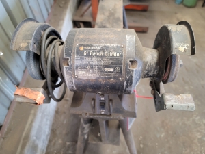 B&D 6" BENCH GRINDER WELDED TO STEEL WORK HORSE-115