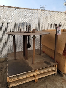 SCRAP STEEL: BOTTOM PLATE IS 4' X 4' X 1/2", TOP PLATE IS A 4' X 1/2" CIRCLE-117