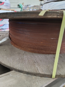 REMNANT OF ROLL OF 5/16" STEEL BAND-145