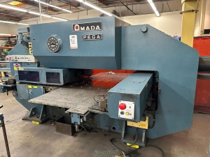 1985 AMADA TURRET PUNCH PRESS MODEL PEGA 345 KING 30 TON 58 STATION 40inch X 50inch SHEET SIZE THICK TURRET BALL TABLE FANUC P 6M CNC CONTROL UNISORB VIBRATION ISOLATION PADS NEW CLUTCH AND BRAKE INSTALLED APPROX. 1 YEAR AGO S N AK450018-31