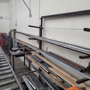 LOT   MATERIAL RACK W  MISC. PIPE CHANNEL RECTANGLE STOCK UP TO 20 ft LENGTHS-69