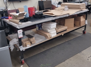 WORKBENCH ON CASTERS W  WOOD TOP 3 ft X 8 ft CONTENTS NOT INCLUDED-106