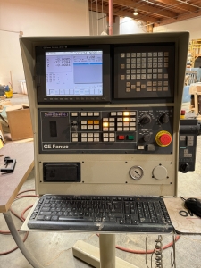 2001 KOMO CNC ROUTER, MODEL VR 510 MACH ONE, GE FANUC SERIES 210i-M CONTROL, 5' X 10' VACUUM TABLE, 8-STATION TOOL CHANGER, S/N 36327-03-01-01-33