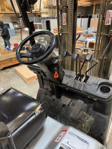 NISSAN ELECTRIC FORKLIFT, MODEL CP1B2L25S, 4,000 LB CAPACITY, 3-STAGE MAST, SIDE SHIFT, SOLID TIRES, 4' FORKS, LOAD LIGHTS, APPROX. 11,751 HOURS, S/N CP1B2-000219, W/ POWERHOUSE BATTERY CHARGER, (DELAYED PICKUP UNTIL FEBRUARY 20)-36