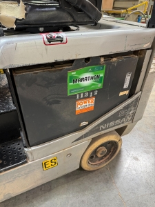 NISSAN ELECTRIC FORKLIFT, MODEL CP1B2L25S, 4,000 LB CAPACITY, 3-STAGE MAST, SIDE SHIFT, SOLID TIRES, 4' FORKS, LOAD LIGHTS, APPROX. 11,751 HOURS, S/N CP1B2-000219, W/ POWERHOUSE BATTERY CHARGER, (DELAYED PICKUP UNTIL FEBRUARY 20)-36