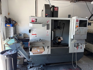 Haas-2022 HAAS DM-2 CNC VERTICAL DRILL/MILL MACHINING CENTER, MOLD MAKER, HAAS CNC CONTROL, TABLE: 34" X 15", XYZ TRAVELS: 28" X 16" X 15", CAT 40 TAPER, 15,000 RPM SPINDLE, SIDE MOUNT 18 ATC, 15 HP, THROUGH SPINDLE COOLANT, PROGRAMMABLE COOLANT NOZZLE, 32 GB EXPANDED MEMORY, WIRELESS INTUITIVE PROBING, TOOL AIR BLAST, CHIP CONVEYOR, 4TH AXIS READY, SUBPLATE, S/N 1197026-25