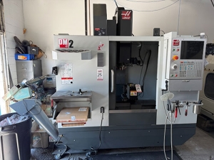 Haas-2022 HAAS DM-2 CNC VERTICAL DRILL/MILL MACHINING CENTER, MOLD MAKER, HAAS CNC CONTROL, TABLE: 34" X 15", XYZ TRAVELS: 28" X 16" X 15", CAT 40 TAPER, 15,000 RPM SPINDLE, SIDE MOUNT 18 ATC, 15 HP, THROUGH SPINDLE COOLANT, PROGRAMMABLE COOLANT NOZZLE, 32 GB EXPANDED MEMORY, WIRELESS INTUITIVE PROBING, TOOL AIR BLAST, CHIP CONVEYOR, 4TH AXIS READY, SUBPLATE, S/N 1197026-25